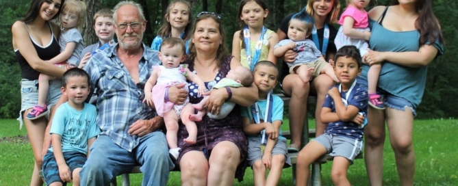 Alice, center with her grandchildren - Gift of Hope